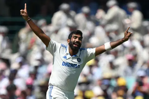 AFP India's Jasprit Bumrah celebrates a successful catch-behind appeal to dismiss Marnus Labuschagne of Australia during the second day of the fifth Test match between Australia and India at the Sydney Cricket Ground on January 4, 2025. 